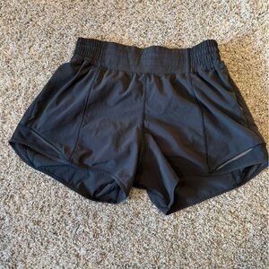 Black lulu lemon hotty hot shorts.  Worn once.  Great condition.